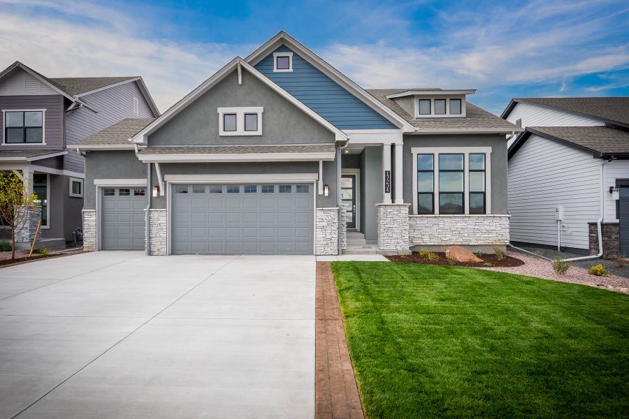 Front exterior of a new home in Cloverleaf - Pinnacle Collection, Monument, CO, highlighting curb appeal (Image 1). Front exterior of a new home in Cloverleaf - Pinnacle Collection, Monument, CO, highlighting curb appeal (Image 1).