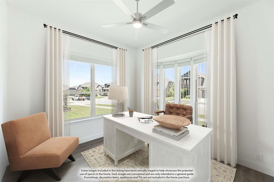 Home office with white desk, ceiling fan, large windows, and hardwood floors overlooking a neighborhood Home office with white desk, ceiling fan, large windows, and hardwood floors overlooking a neighborhood
