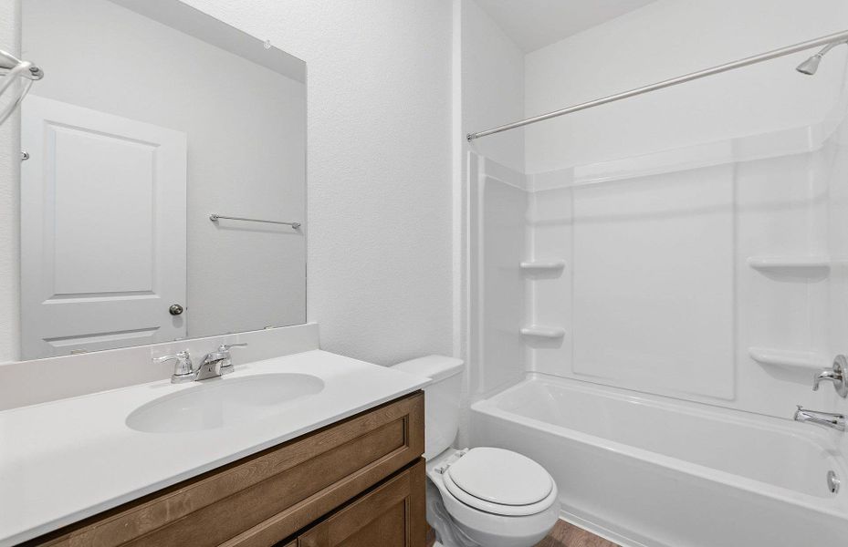 Furnished interior view inside a new home in Crosswinds, Kyle (Image 7).