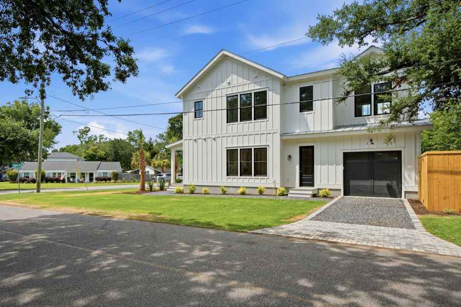 Front exterior of a new home in , Mount Pleasant, SC, highlighting curb appeal (Image 1). Front exterior of a new home in , Mount Pleasant, SC, highlighting curb appeal (Image 1).