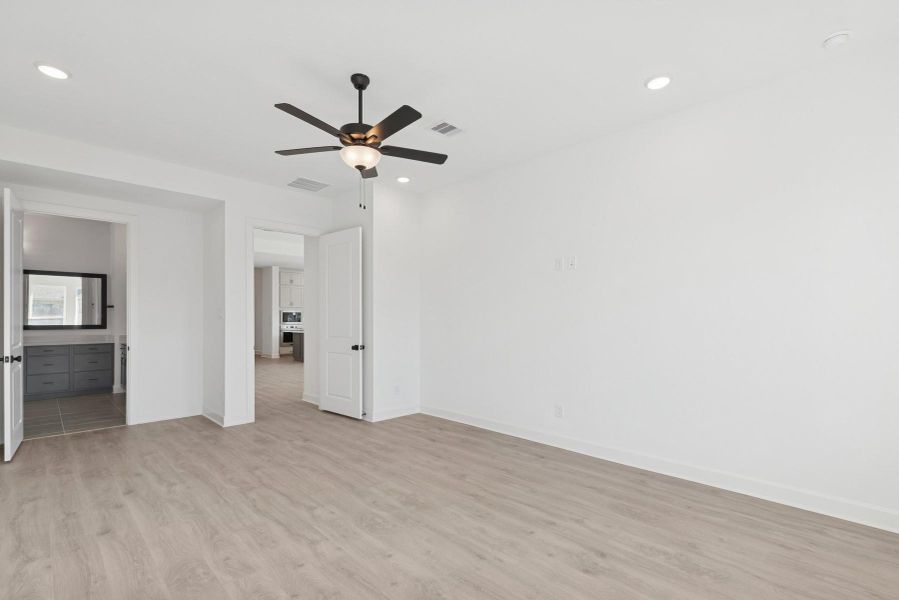 Spacious, unfurnished interior of a new home in The Highlands 55' - Encore Collection, Porter (Image 17). Spacious, unfurnished interior of a new home in The Highlands 55' - Encore Collection, Porter (Image 17).