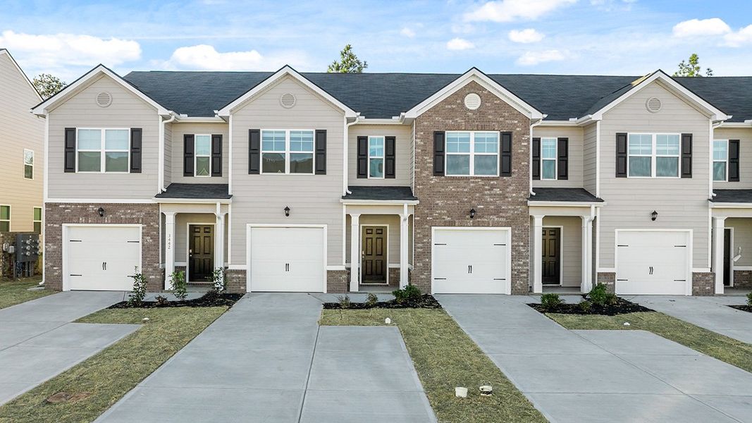 Front exterior of a new home in Laurel Park Townhomes, Hephzibah, GA, highlighting curb appeal (Image 2).