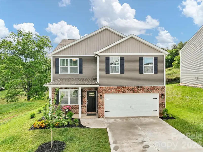 Front exterior of a new home in Valleywood Farms, Waynesville, NC, highlighting curb appeal (Image 22).