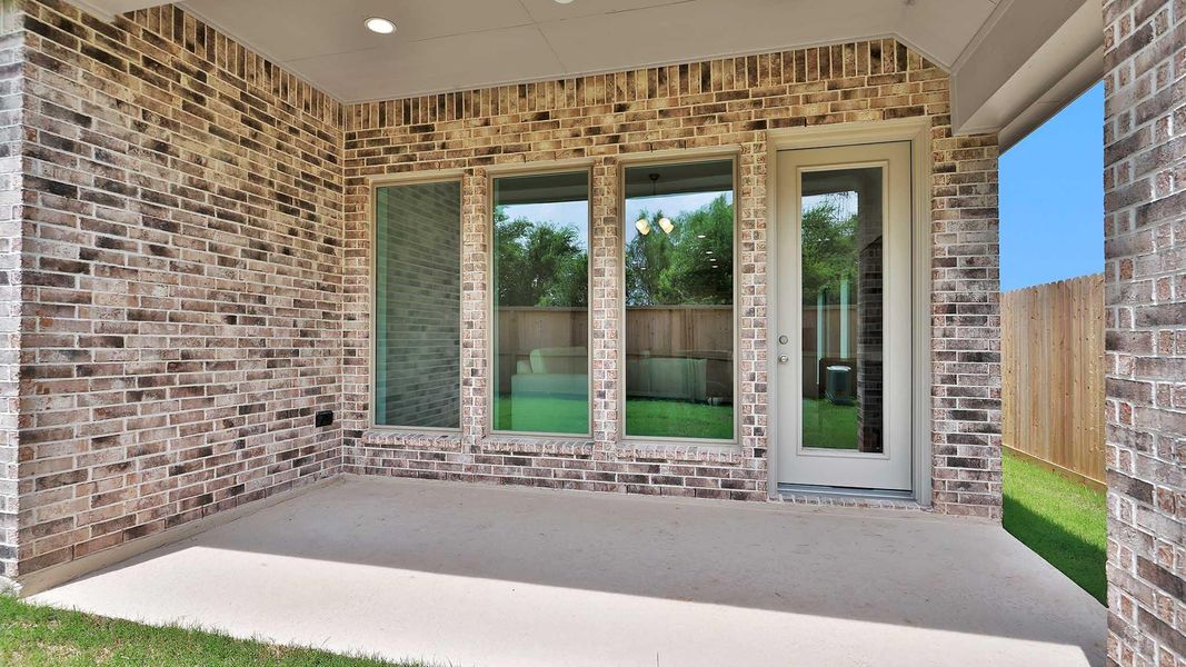 Exterior details and patio area of a home in Harvest Green, Richmond (Image 10).