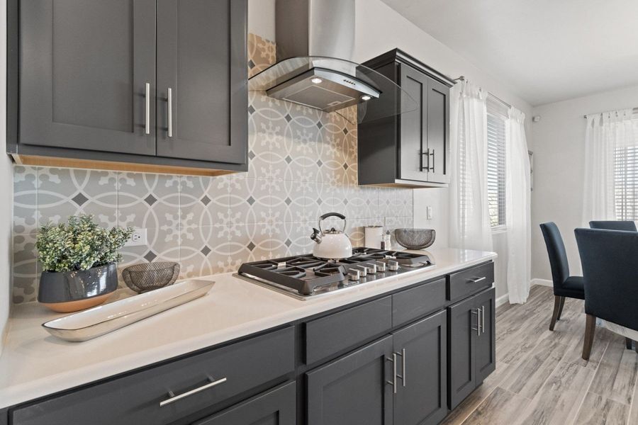 Representative furnished interior of a home built from the Valencia by Hakes Brothers in Hillside Park, El Paso (Image 16).