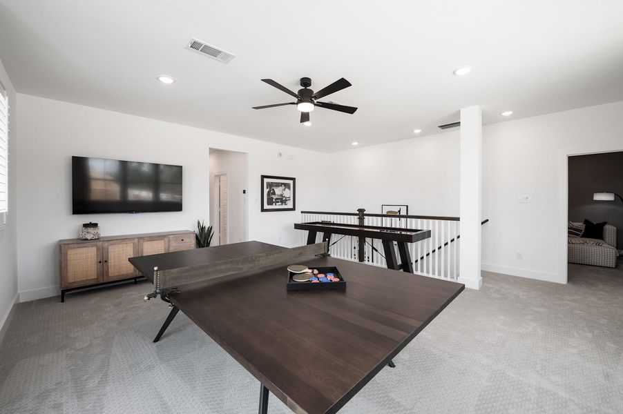 Representative furnished interior of a home built from the Wren by Tri Pointe Homes in Oakhill Reserve, Tomball (Image 26).