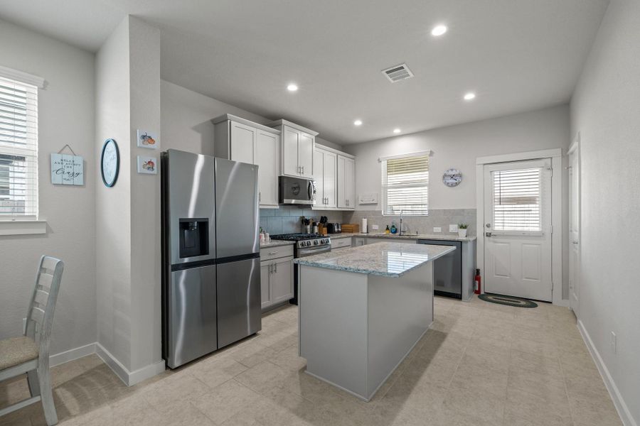 Furnished interior view inside a new home in , Iowa Colony (Image 12).