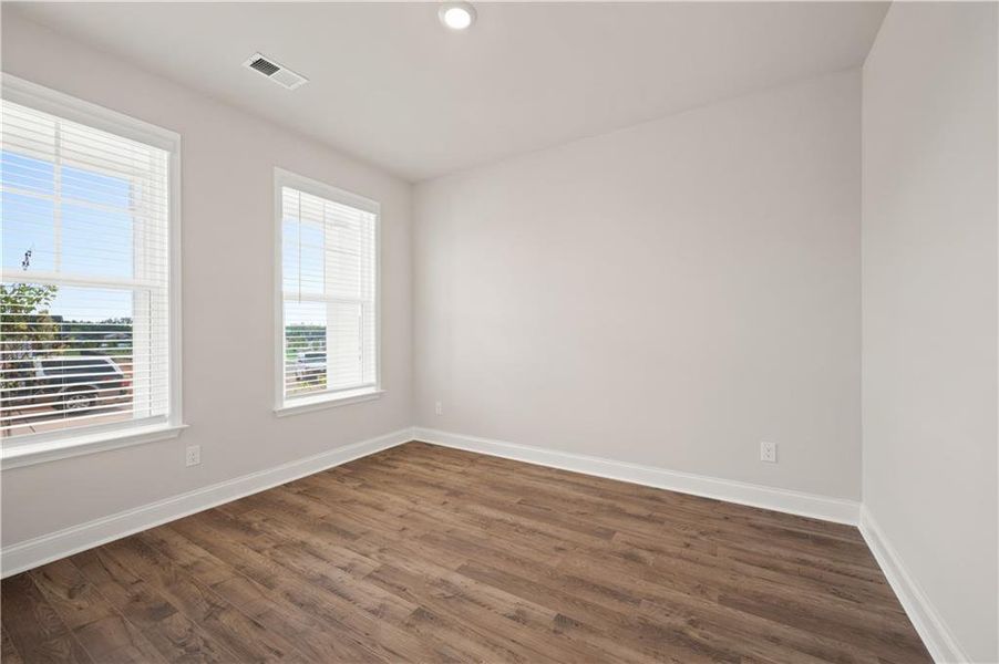 Spacious, unfurnished interior of a new home in Oak Ridge Meadows - Active Adult, Locust Grove (Image 17).