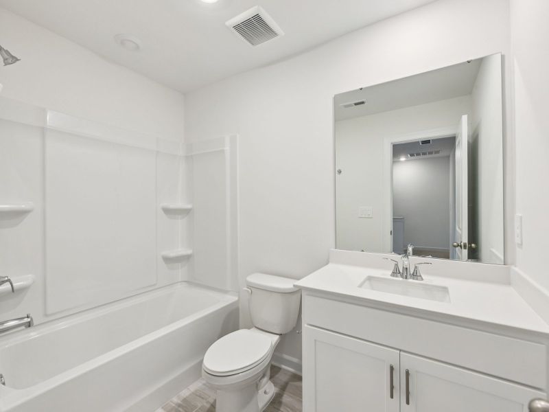 Furnished interior view inside a new home in Rocky River Towns, Charlotte (Image 3).