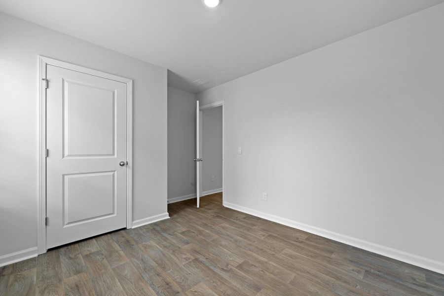 Spacious, unfurnished interior of a new home in Pine Hills at Cane Bay, Summerville (Image 13). Spacious, unfurnished interior of a new home in Pine Hills at Cane Bay, Summerville (Image 13).