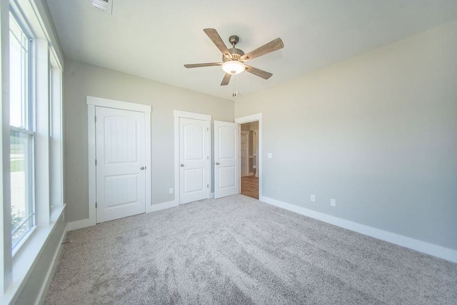 Representative unfurnished interior of a home built from the Beaumont Elite by Enchanted Homes in Pointe Summit, Slater-Marietta (Image 25).