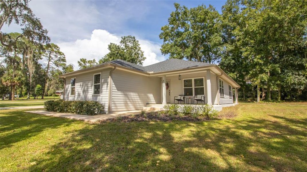 Front exterior of a new home in , Melrose, FL, highlighting curb appeal (Image 12). Front exterior of a new home in , Melrose, FL, highlighting curb appeal (Image 12).