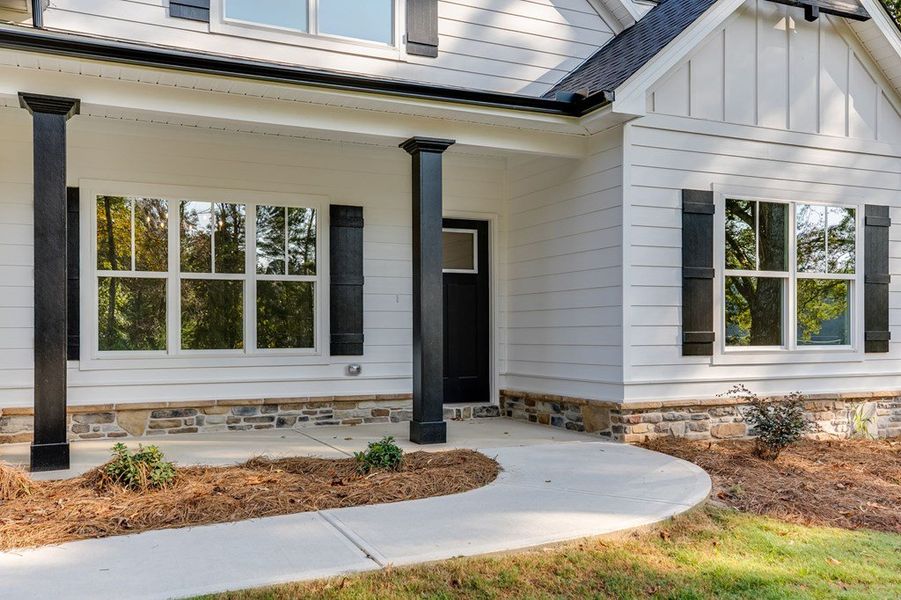 Front exterior of a new home in LOVVORN ESTATES, Carrollton, GA, highlighting curb appeal (Image 25).