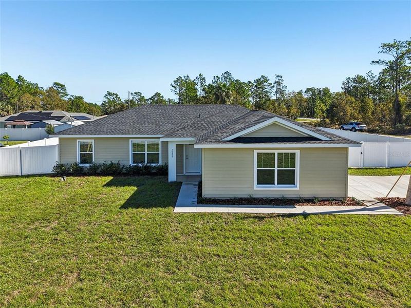 Front exterior of a new home in , Ocala, FL, highlighting curb appeal (Image 22).