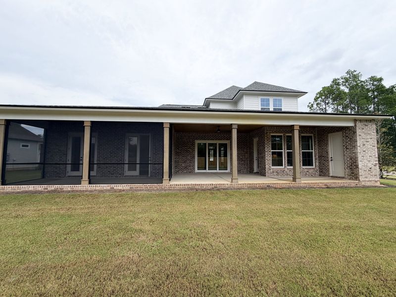 Exterior details and patio area of a home in Steamboat Landing at Hammock Bay, Freeport (Image 28).