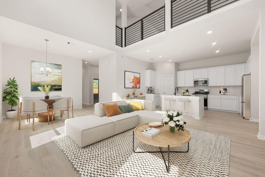 Bright and open living space featuring soaring ceilings, large windows, and beautiful light wood flooring. The modern kitchen offers sleek white cabinetry, stainless steel appliances, and a spacious island that flows seamlessly into the dining area, perfect for everyday living and entertaining.