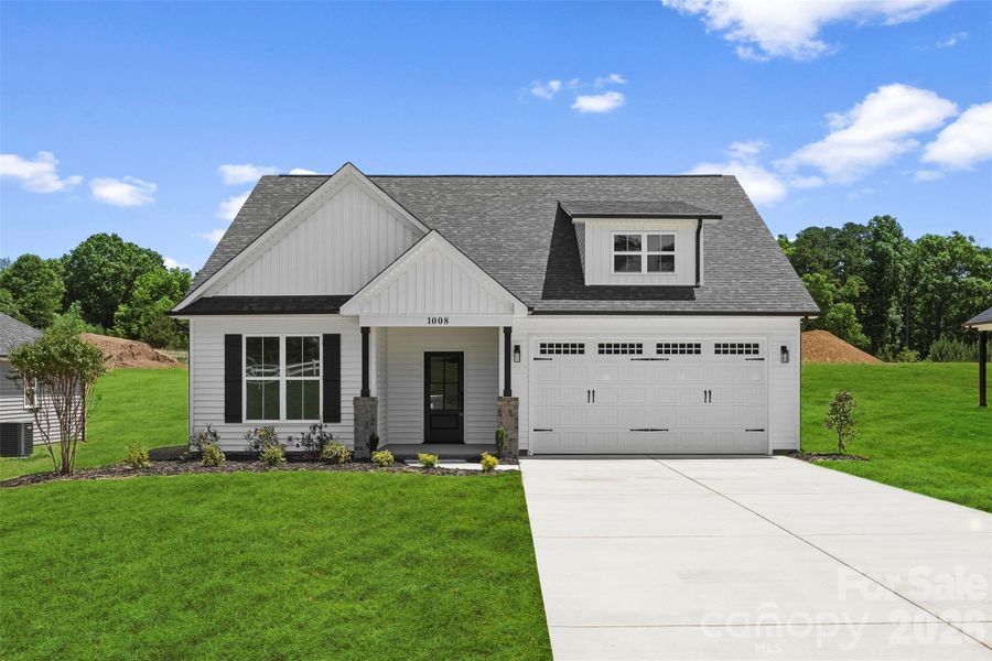 Front exterior of a new home in , Albemarle, NC, highlighting curb appeal (Image 20).