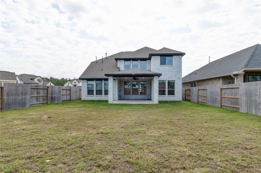 Exterior details and patio area of a home in , New Caney (Image 20). Exterior details and patio area of a home in , New Caney (Image 20).