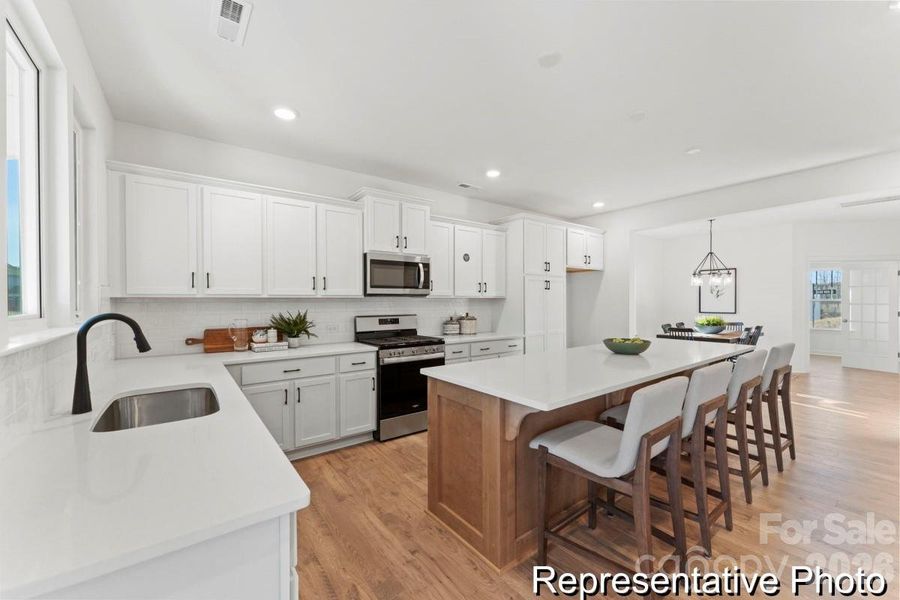 Furnished interior view inside a new home in Whispering Hills, Locust (Image 4).