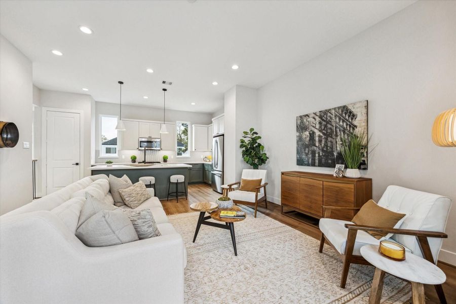 The living room is open to the kitchen making this home great for entertaining and everyday living.