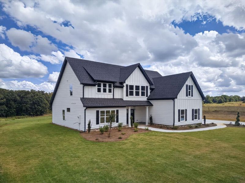 Front exterior of a new home in Blackwelder Bluff, Bowdon, GA, highlighting curb appeal (Image 28).