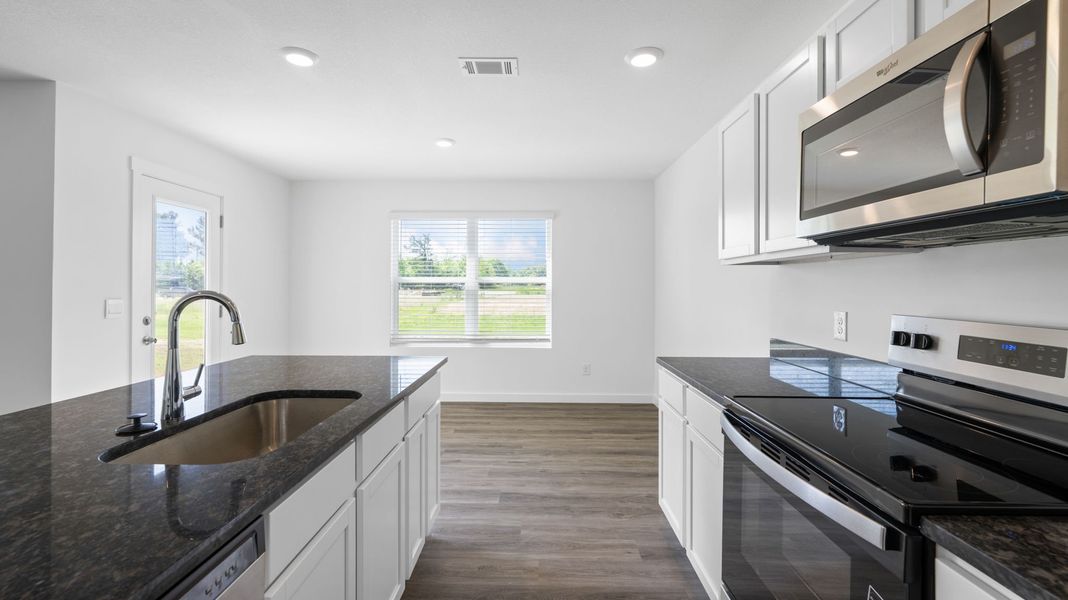 Furnished interior view inside a new home in Evergreen Landing, Rossville (Image 9).