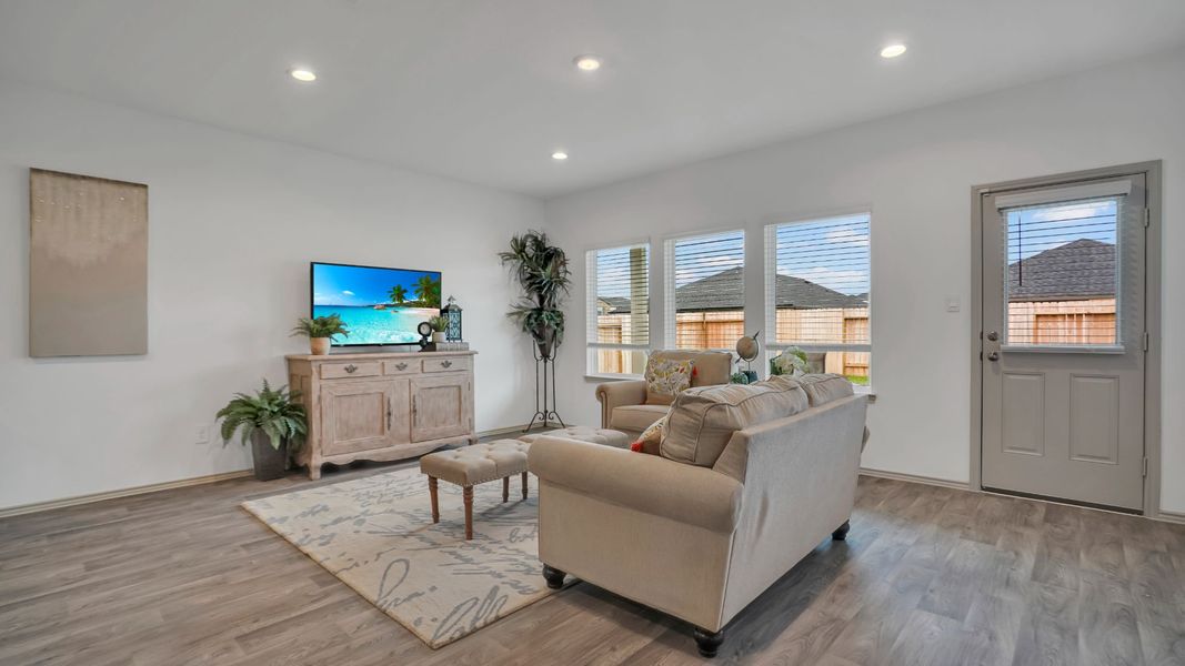 Representative furnished interior of a home built from the MITCHELL by D.R. Horton in Westward Pointe, Sealy (Image 8).