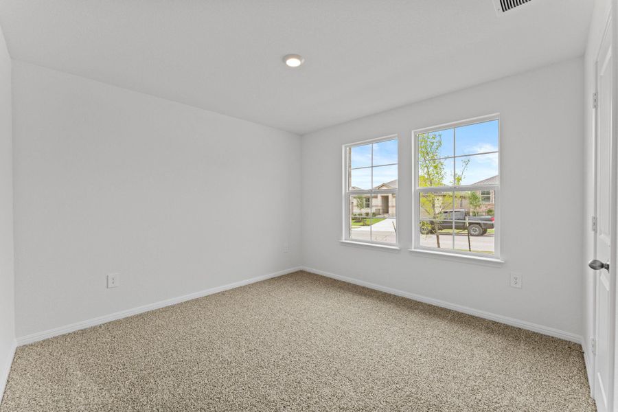 Spacious, unfurnished interior of a new home in Bar W Ranch, Leander (Image 17).