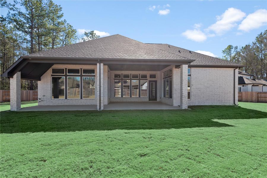 Front exterior of a new home in , Conroe, TX, highlighting curb appeal (Image 25). Front exterior of a new home in , Conroe, TX, highlighting curb appeal (Image 25).