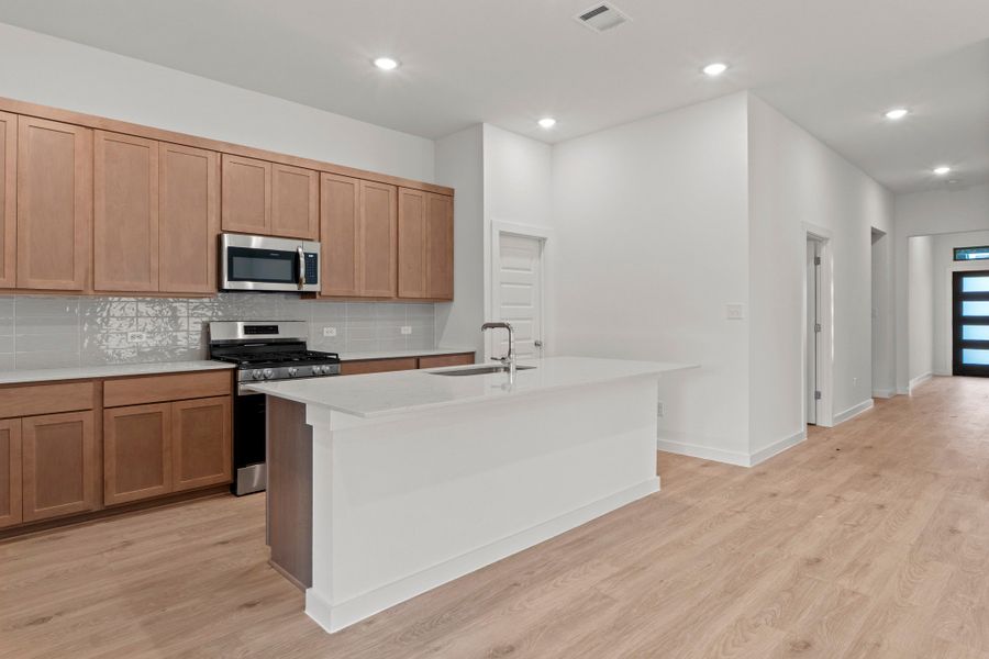Furnished interior view inside a new home in Prairie Winds, Hutto (Image 7).