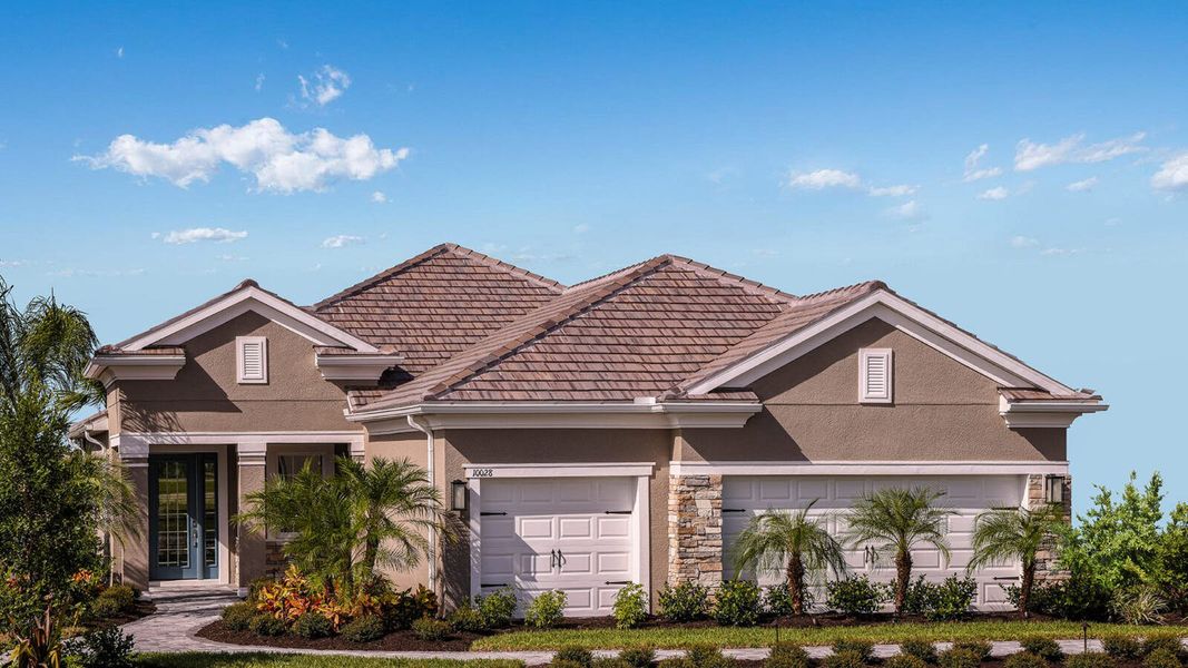 Front exterior of a new home in Grand Park Real Estate and Homes for Sale in Sarasota, FL - Neal Communities, Sarasota, FL, highlighting curb appeal (Image 2). Front exterior of a new home in Grand Park Real Estate and Homes for Sale in Sarasota, FL - Neal Communities, Sarasota, FL, highlighting curb appeal (Image 2).