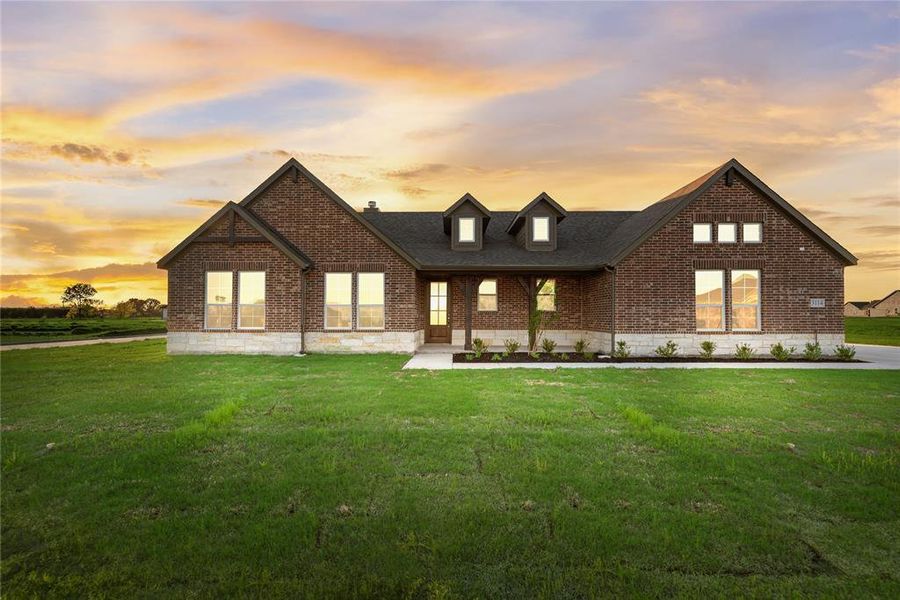Front exterior of a new home in Oak Valley, Oak Ridge, TX, highlighting curb appeal (Image 26).