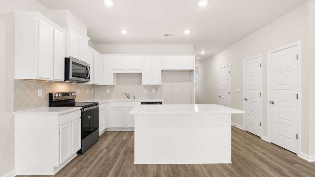 Furnished interior view inside a new home in The Gables at Agricultural Village, Perry (Image 6).