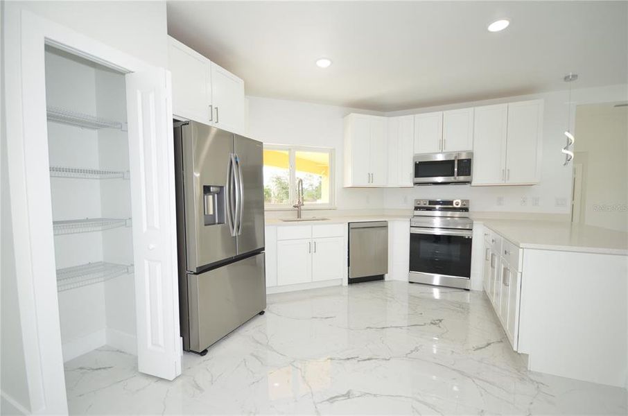 Furnished interior view inside a new home in , Lehigh Acres (Image 4).