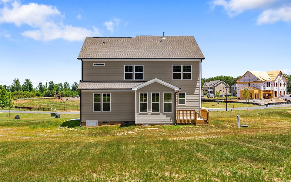 Exterior details and patio area of a home in Lilah Grove, Summerfield (Image 22).