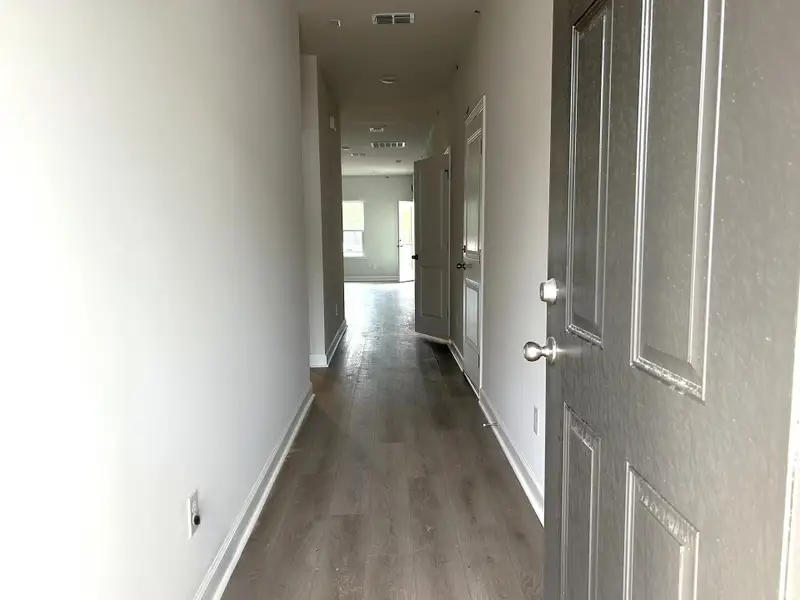 Spacious, unfurnished interior of a new home in Tea Farm, Ravenel (Image 9). Spacious, unfurnished interior of a new home in Tea Farm, Ravenel (Image 9).