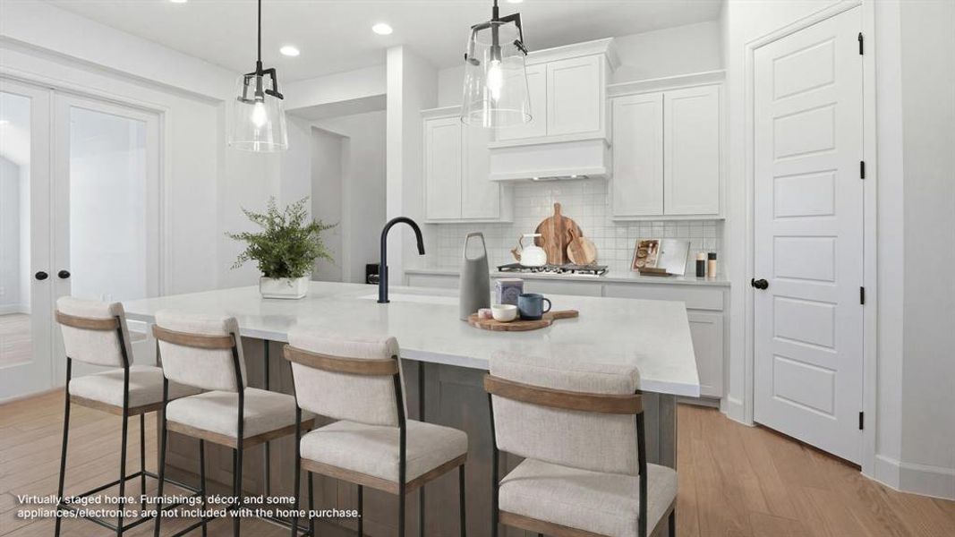 Furnished interior view inside a new home in The Heights at Uptown Celina, Celina (Image 10).