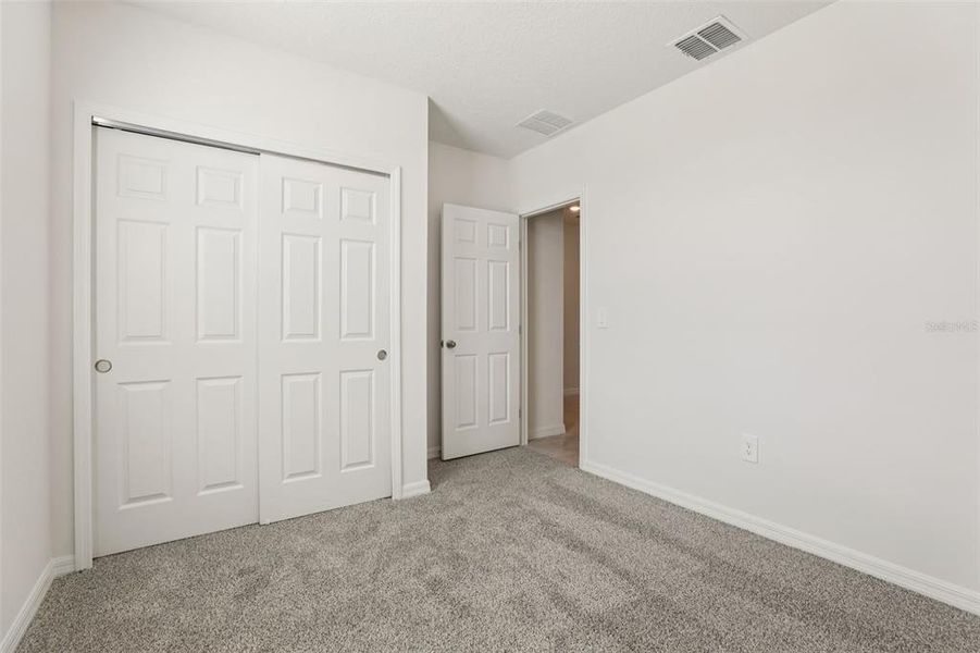 Spacious, unfurnished interior of a new home in Lawson Dunes - Signature Series, Haines City (Image 17).