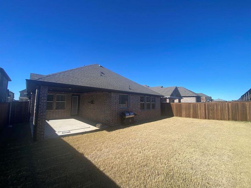 Exterior details and patio area of a home in Creekshaw, Royse City (Image 3).