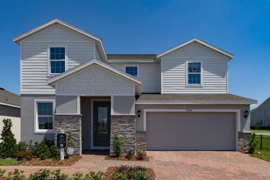 Representative exterior photo of a completed home built from the Lopez by Trinity Family Builders in Trinity Gardens, Deland, FL (Image 29).