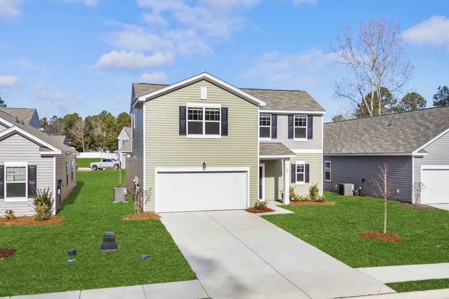 Representative exterior photo of a completed home built from the Hubble by Starlight Homes in Andalusia, Loris, SC (Image 24).