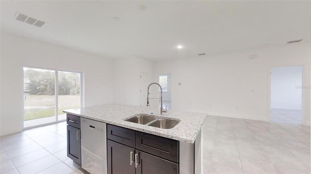 Furnished interior view inside a new home in , Dunnellon (Image 4).