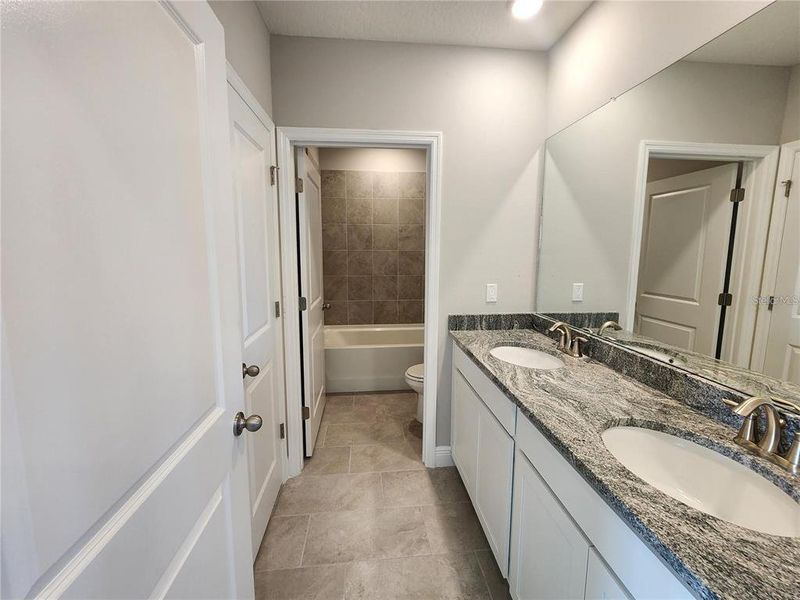 Furnished interior view inside a new home in Woodcreek, Wesley Chapel (Image 8).