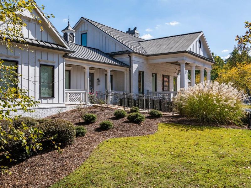 Front exterior of a new home in Hamptons at Riverwood East, Dallas, GA, highlighting curb appeal (Image 35).