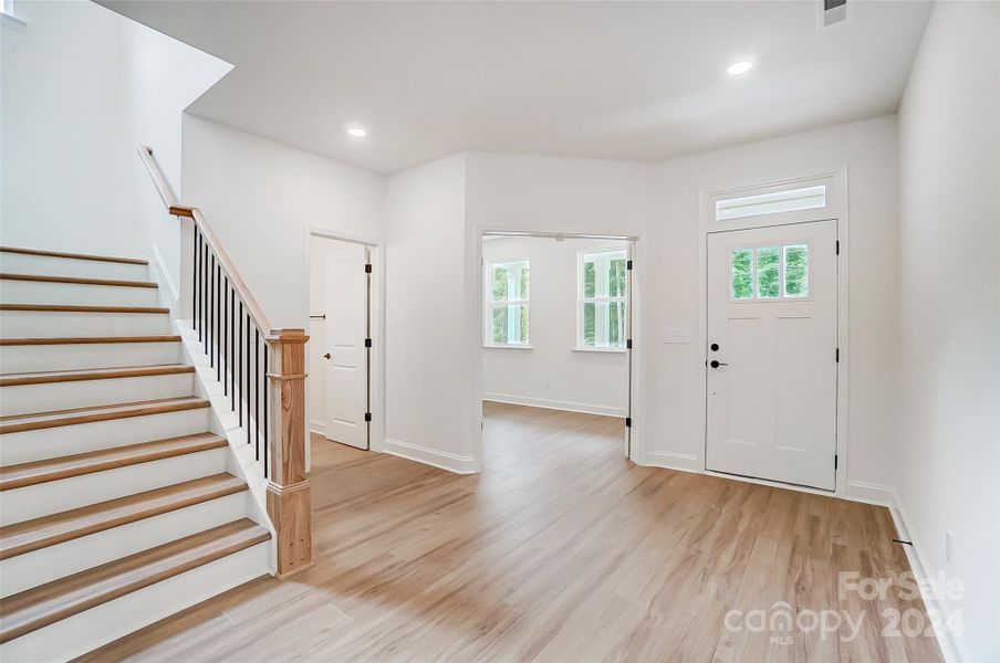 Entry with den and powder room