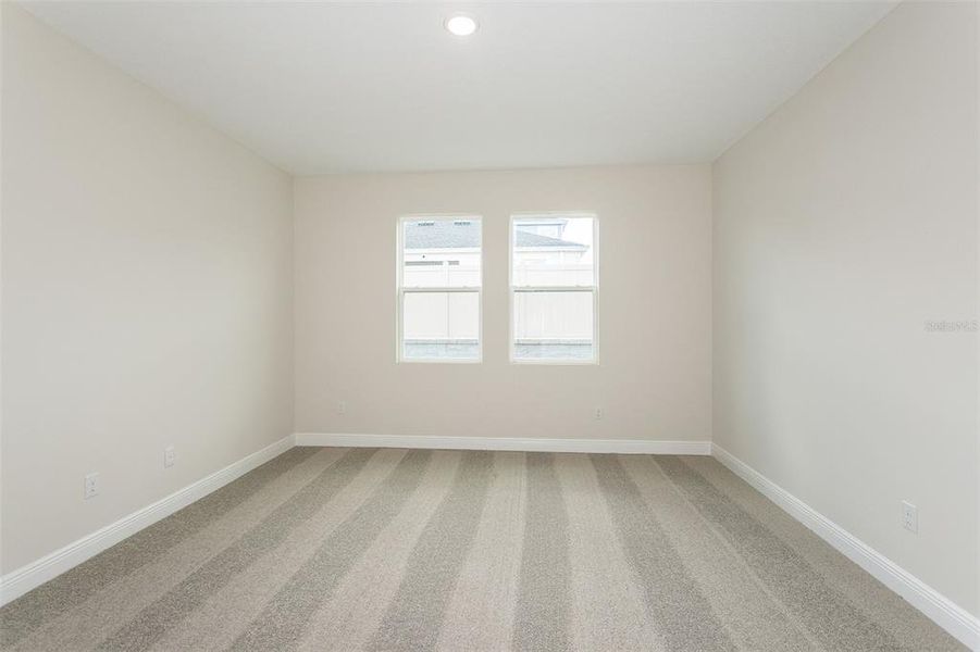 Spacious, unfurnished interior of a new home in Pasadena Woods, Dade City (Image 13).