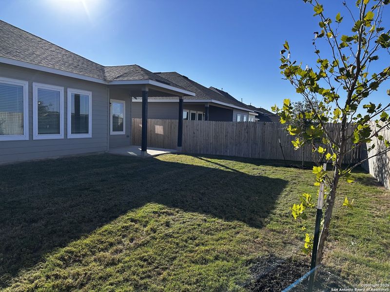 Exterior details and patio area of a home in Hennersby Hollow, San Antonio (Image 3).