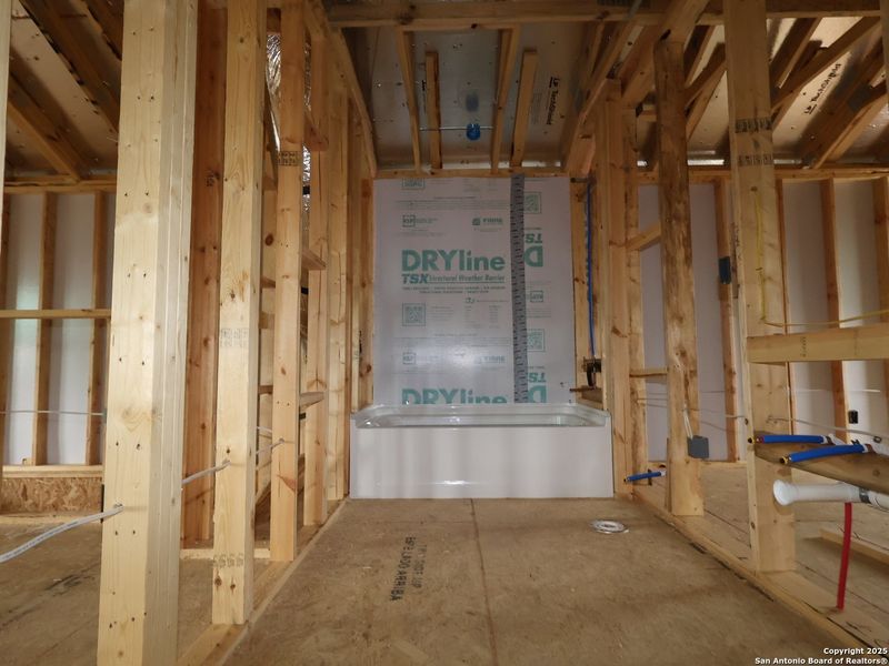 In-progress construction of a new home in Winding Brook, San Antonio, TX (Image 30).