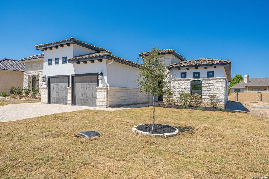 Front exterior of a new home in , Kerrville, TX, highlighting curb appeal (Image 17).