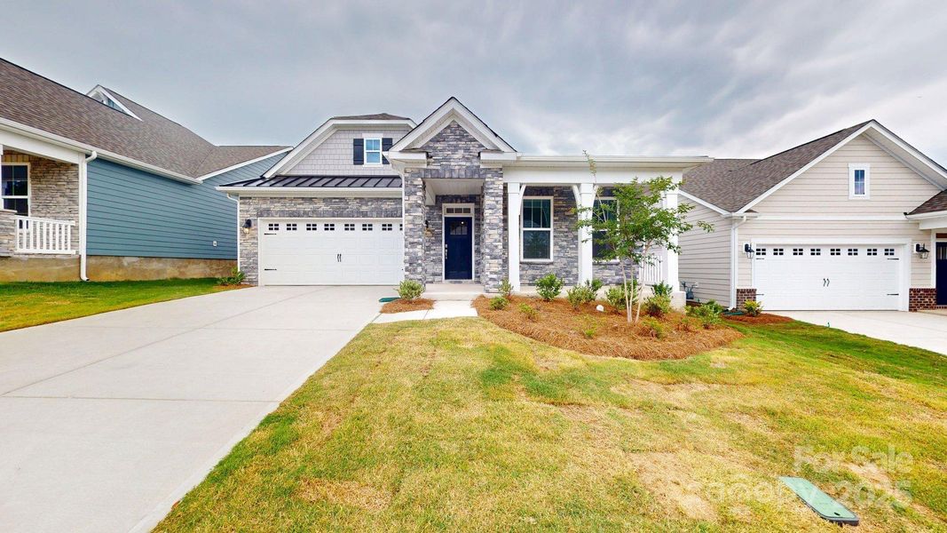 Front exterior of a new home in Westport, York, SC, highlighting curb appeal (Image 1). Front exterior of a new home in Westport, York, SC, highlighting curb appeal (Image 1).
